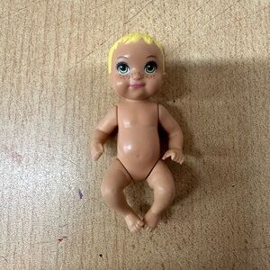 Adorable Tan Baby Doll